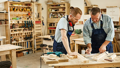 Two men woodworking